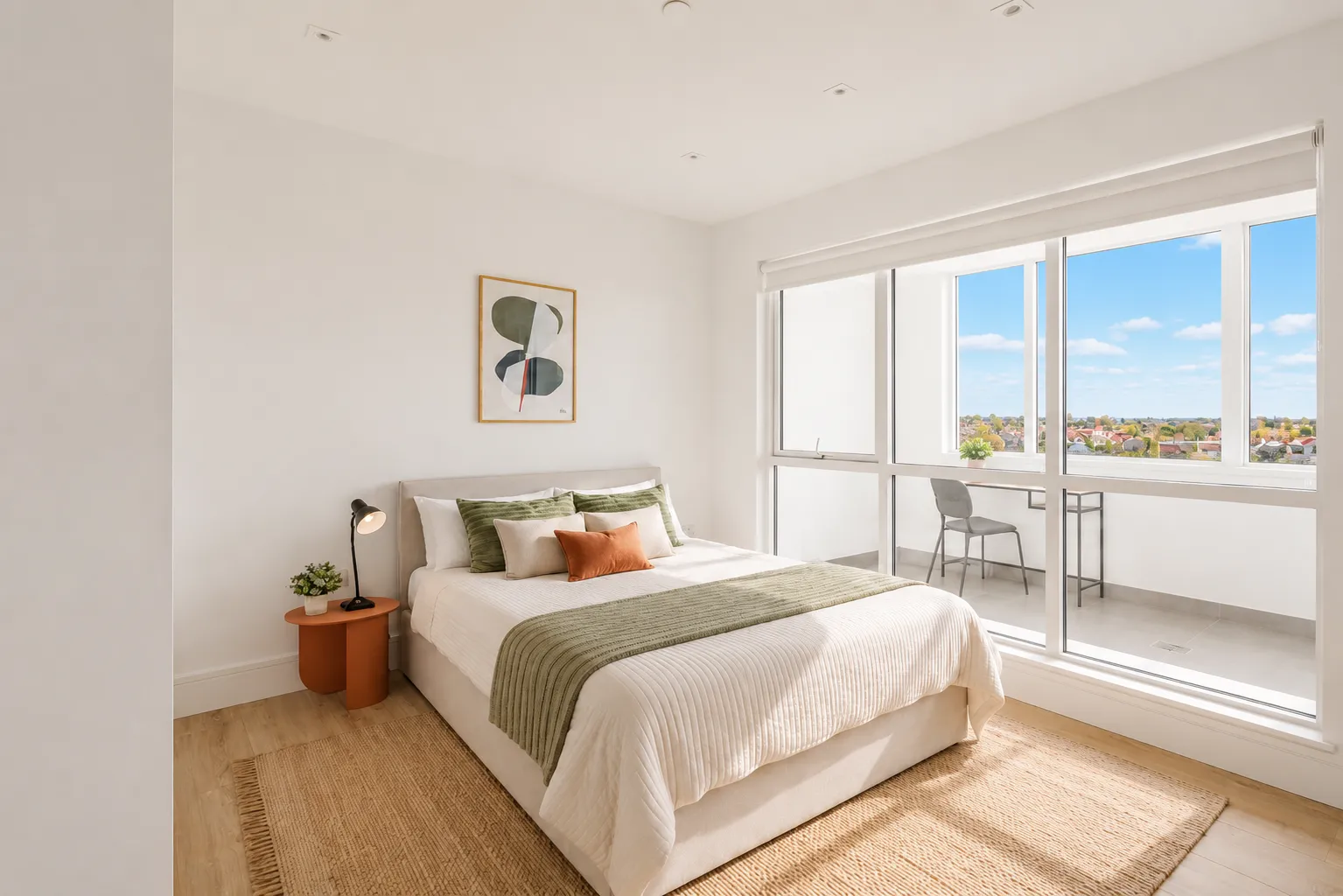 Double bedroom with a window overlooking the city, in a one-bedroom flat at Vonder Wembley