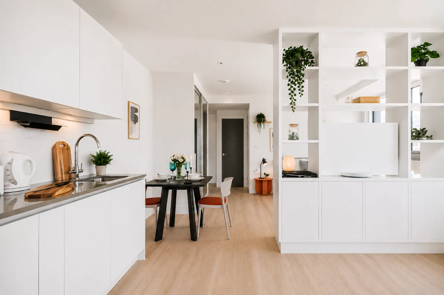 Kitchen and dining area with open shelving, in a one-bedroom flat at Vonder Wembley