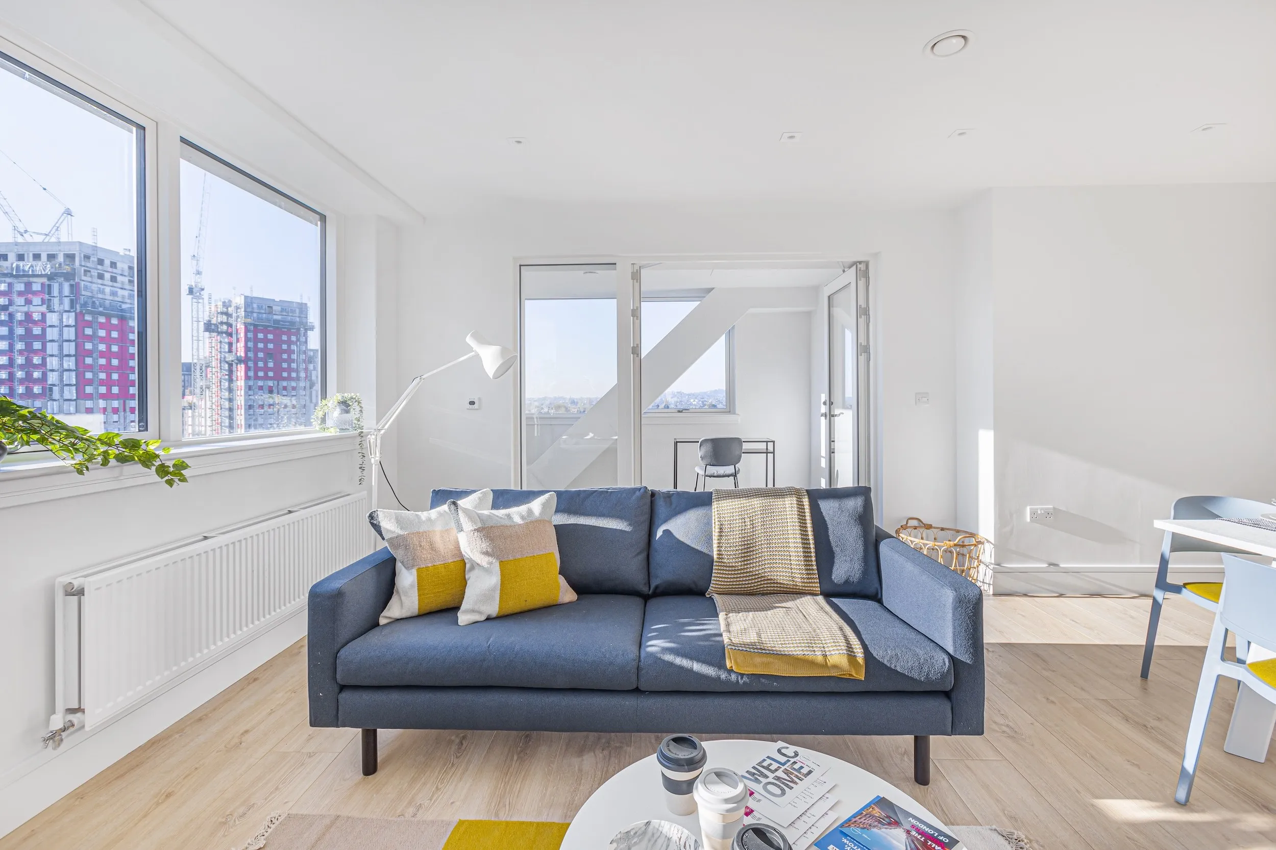 Living area in a three-bedroom apartment at Vonder Wembley