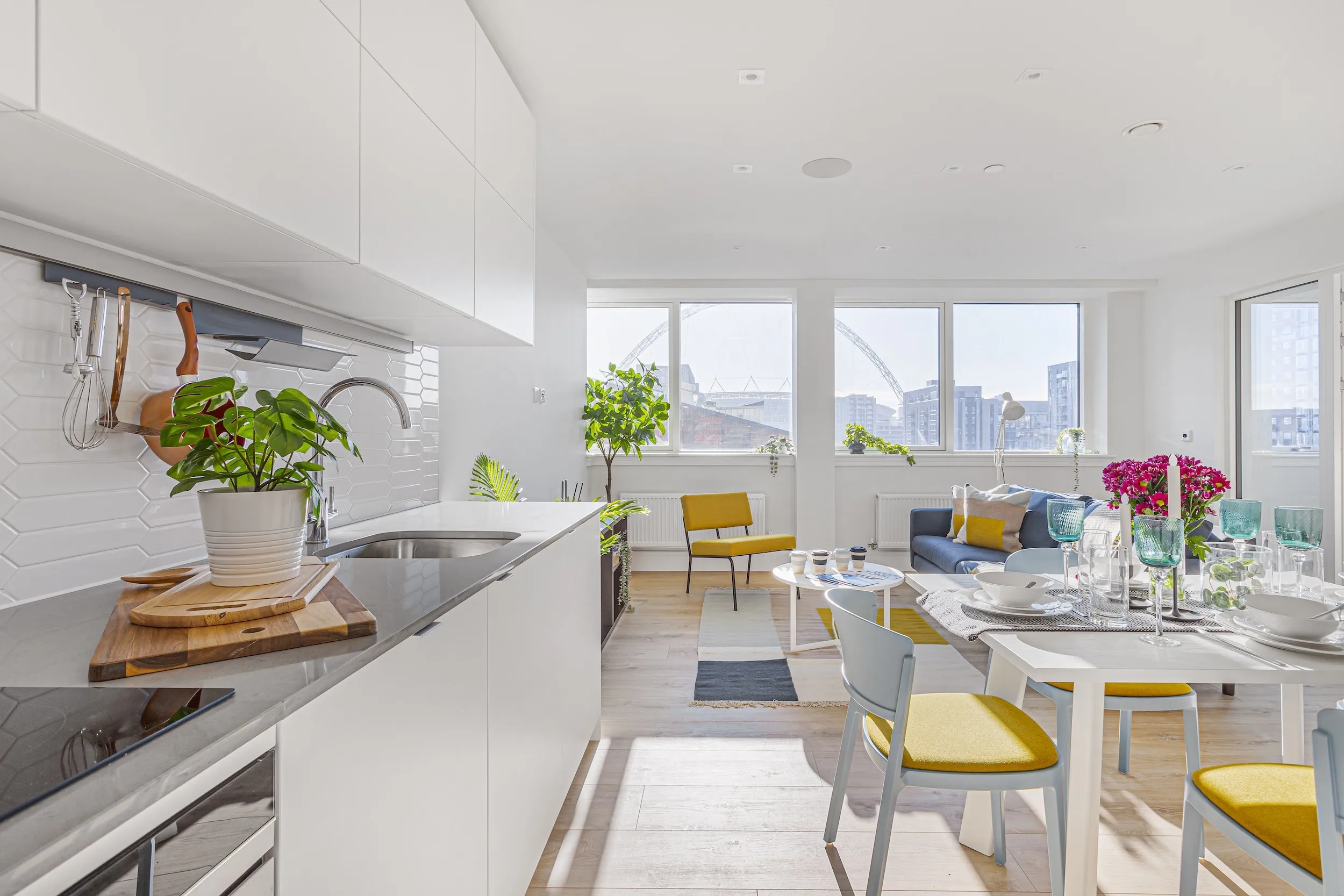 Kitchen and dining area in a three-bedroom apartment at Vonder Wembley
