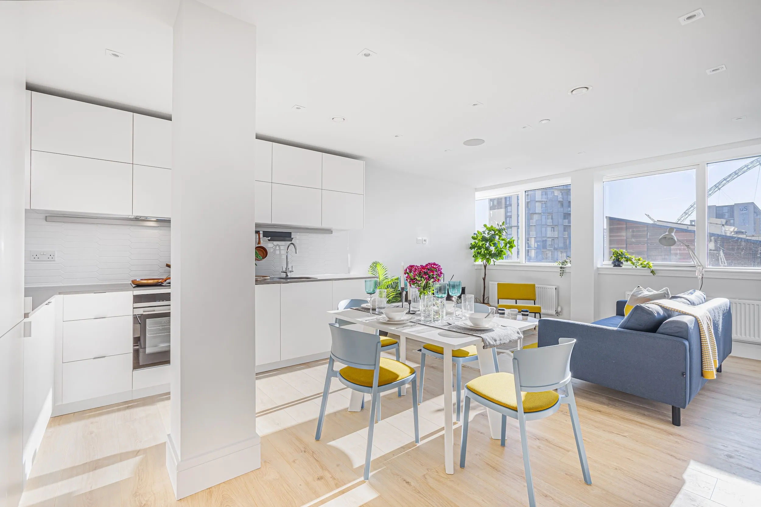 Kitchen and dining area in a three-bedroom apartment at Vonder Wembley