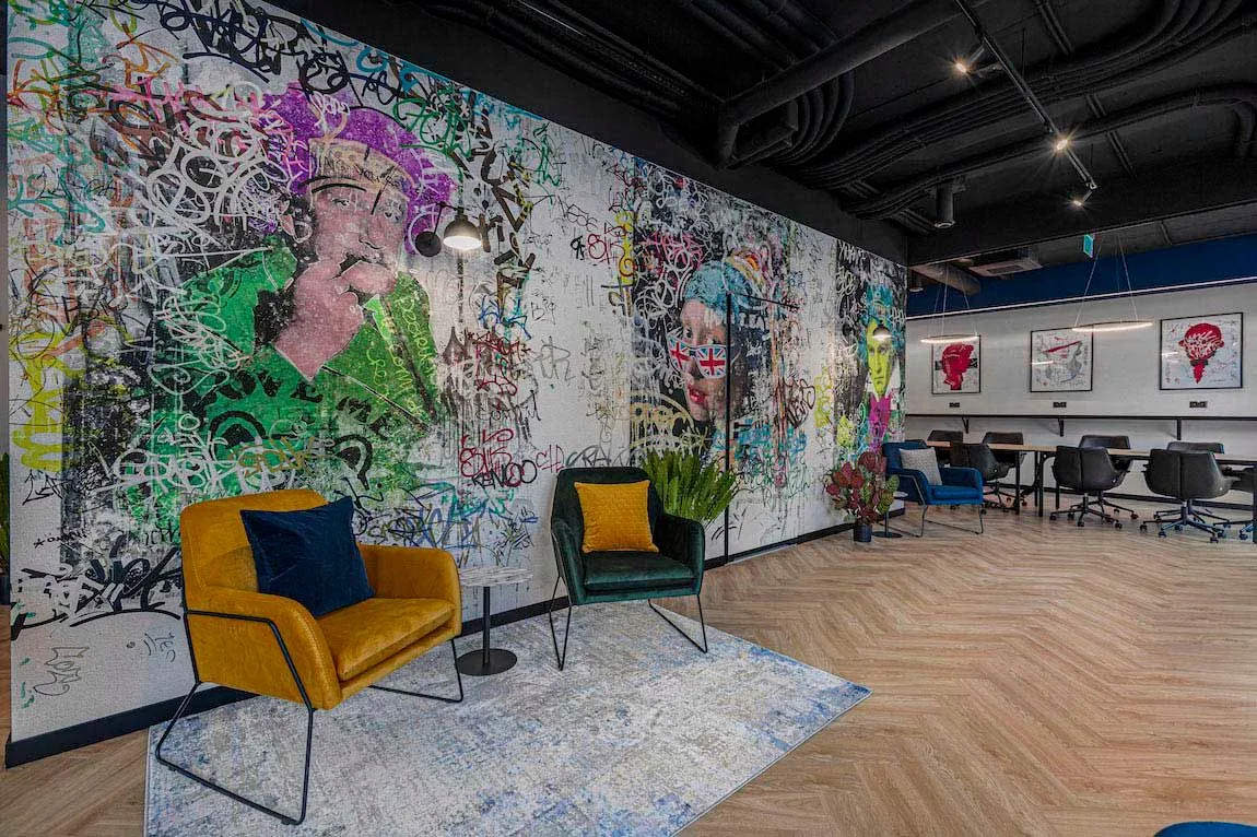 Seating area with mural at Vonder Uptown