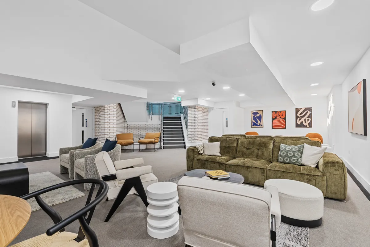 Lounge seating beside the lift lobby at Vonder Akron House