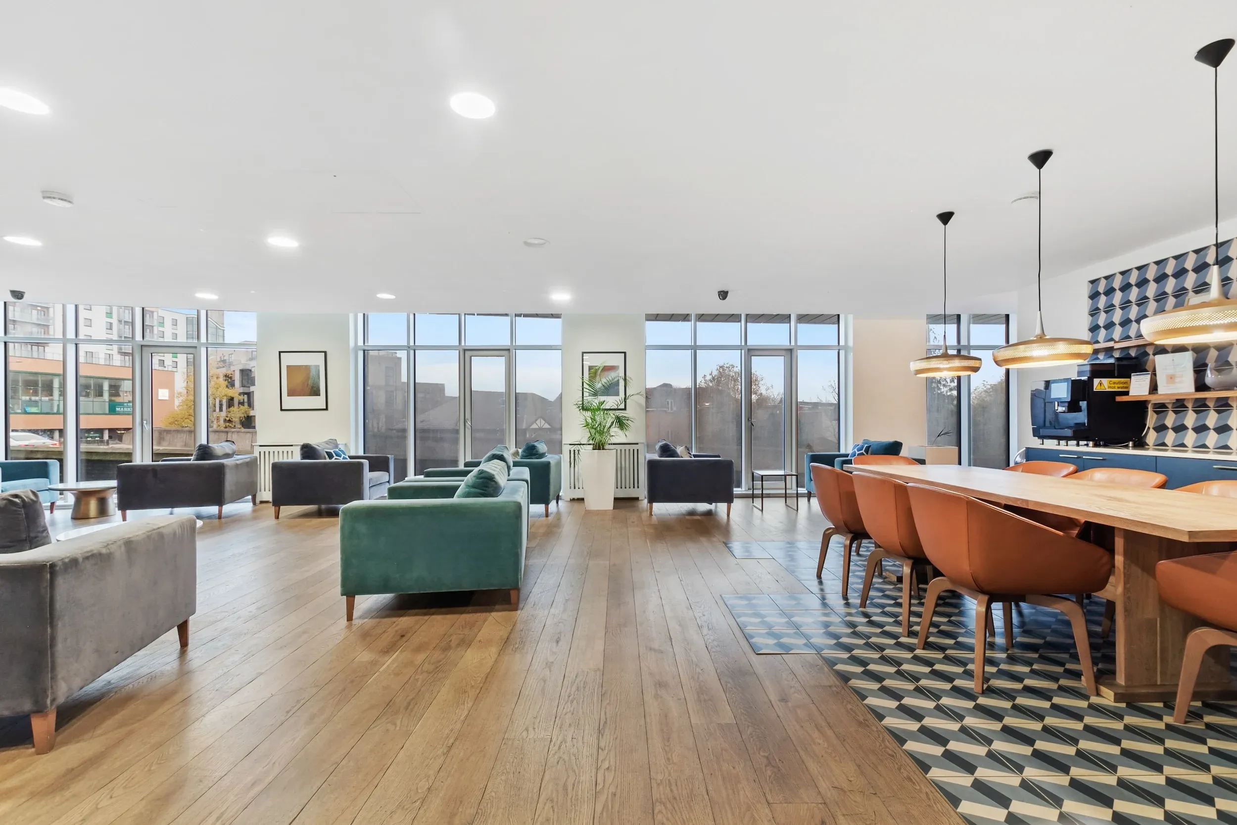 Residents' lounge at Vonder Bradstowe with sofas and floor-to-ceiling windows