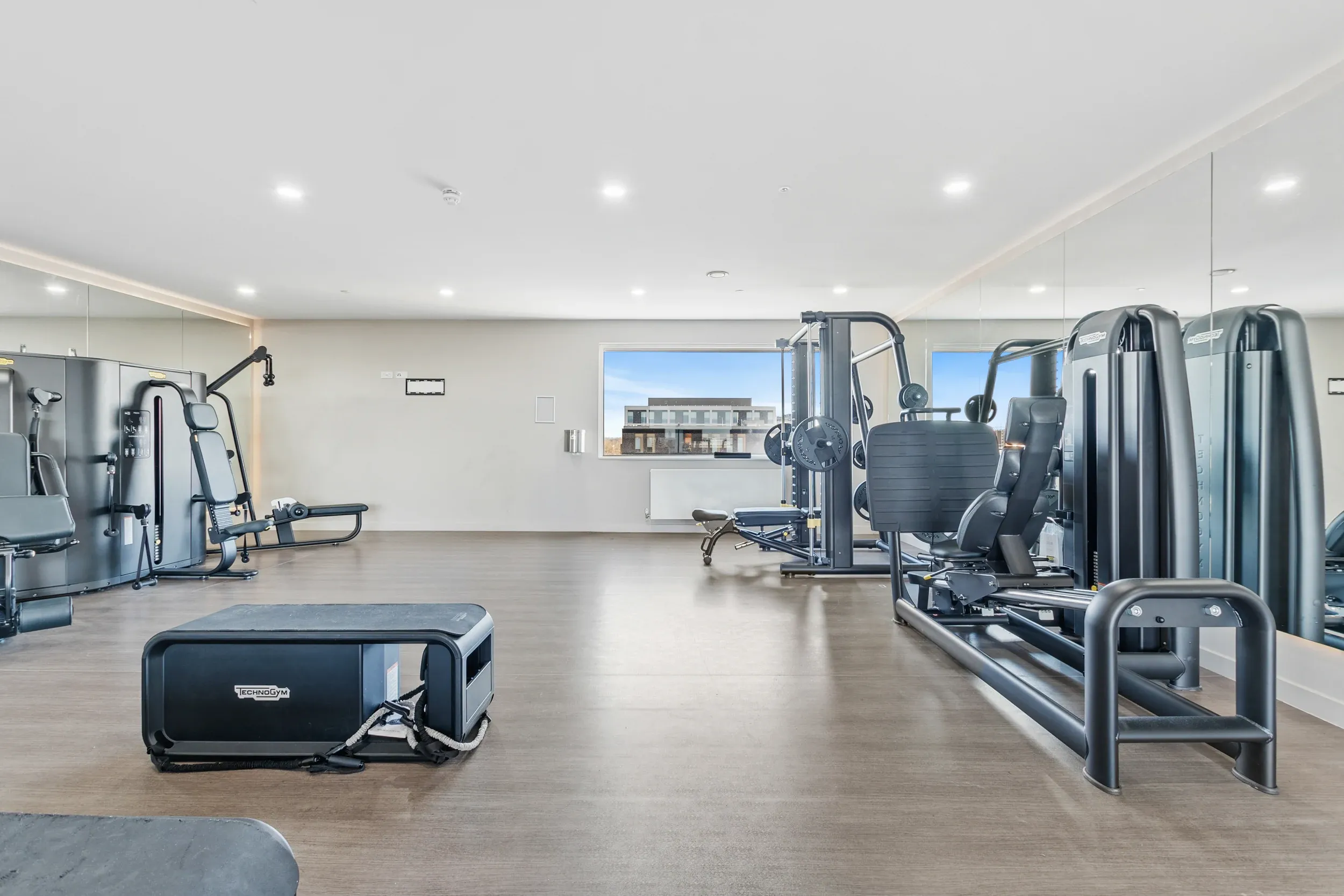 Residents' gym at Vonder Crawley, with resistance machines and free weights