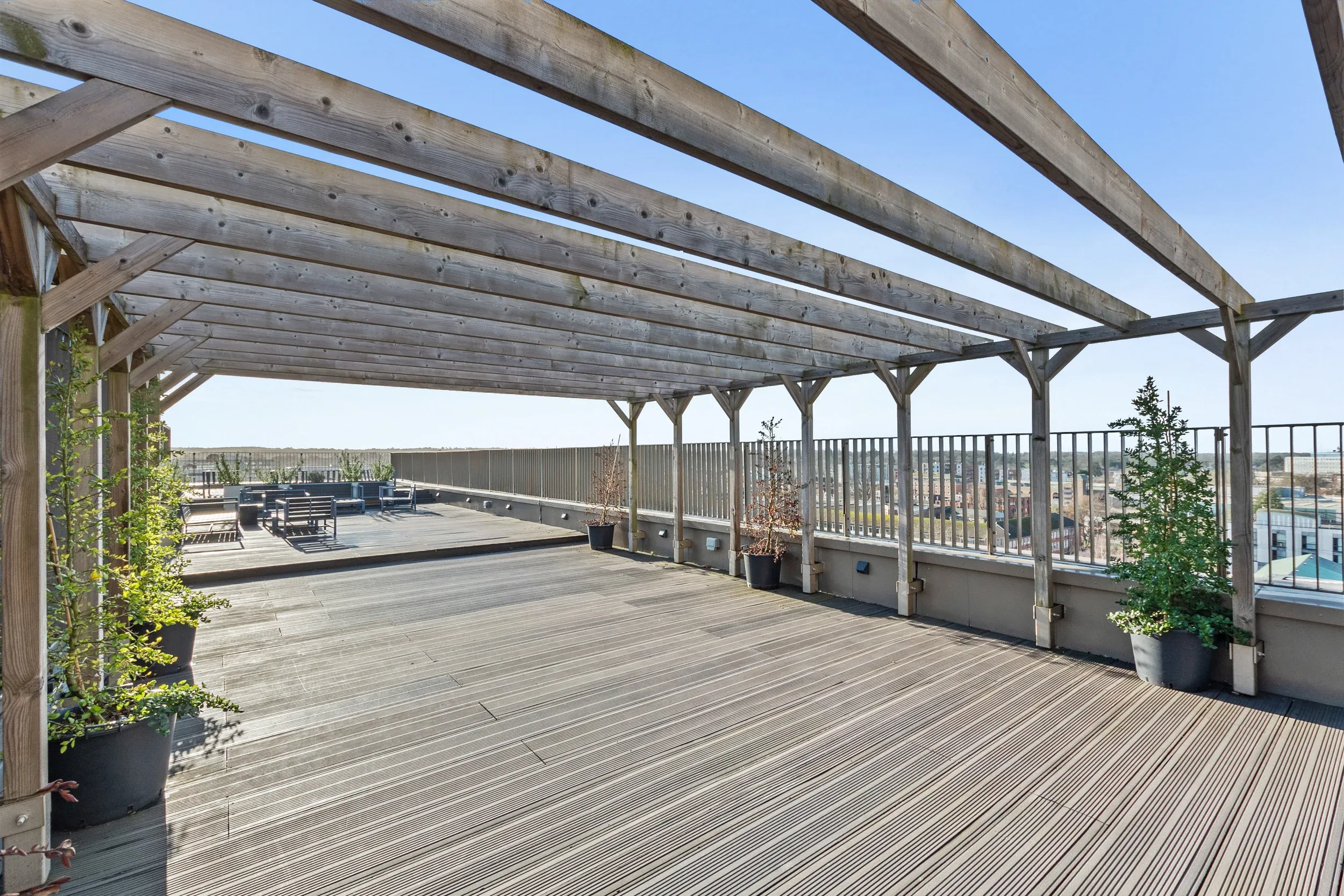 Seating under the pergola on the roof terrace at Vonder Crawley