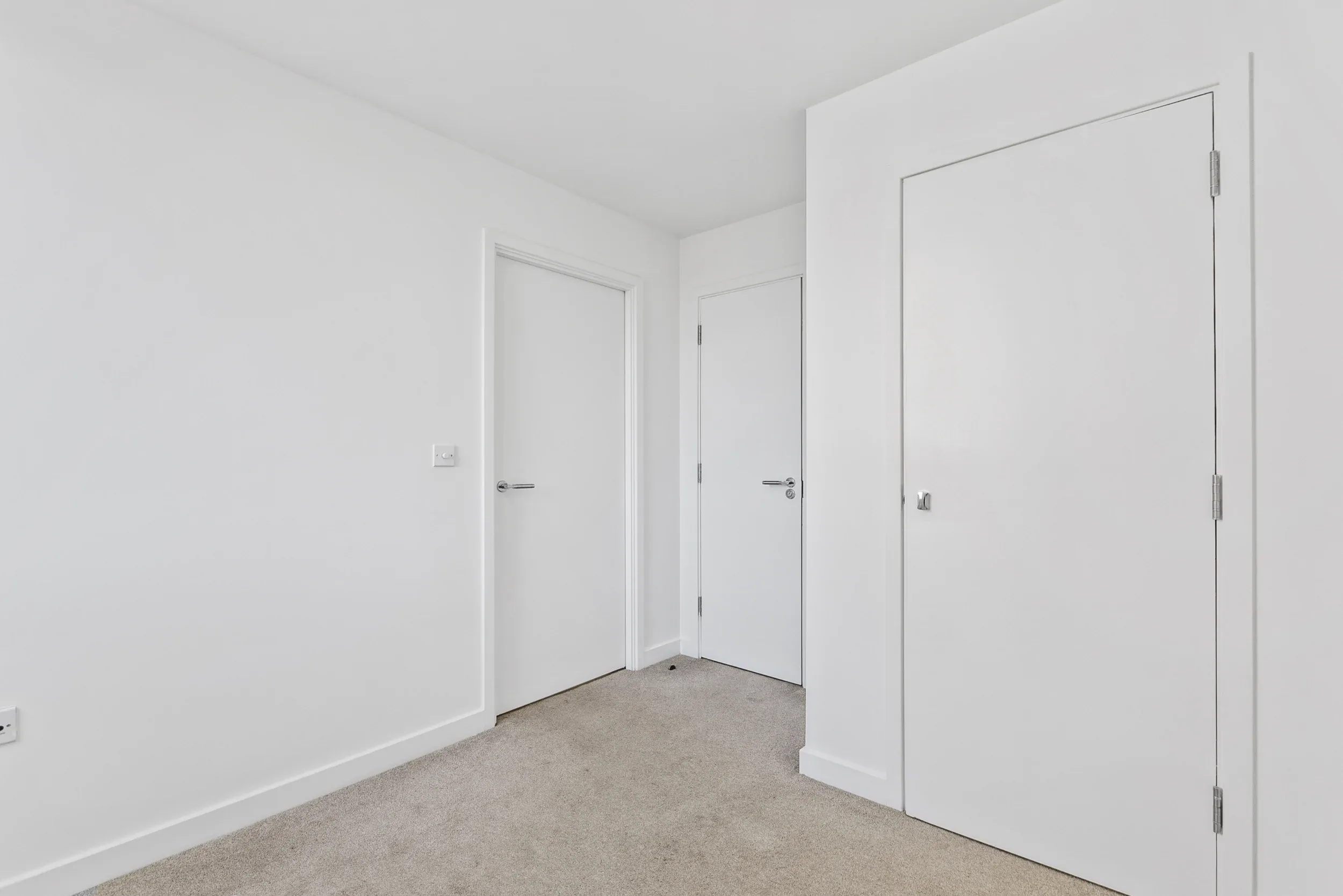 Bedroom in a two-bedroom flat at Vonder Crawley, shown unfurnished