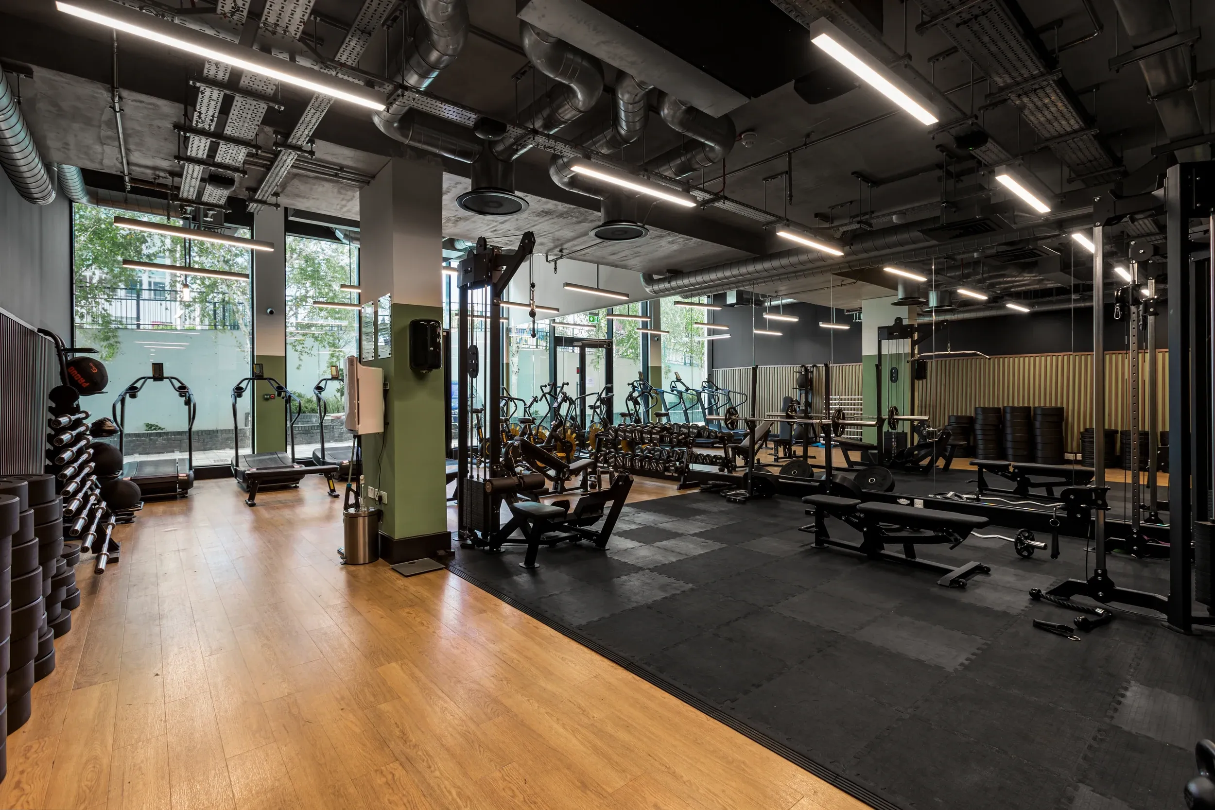 Residents' gym at Vonder Wembley, with free weights, benches and resistance machines