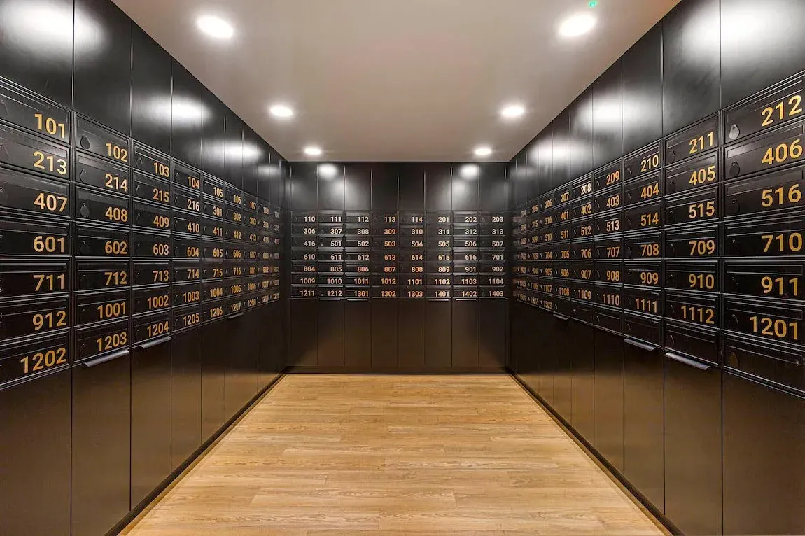 Parcel room at Vonder Wembley with numbered lockers for resident deliveries