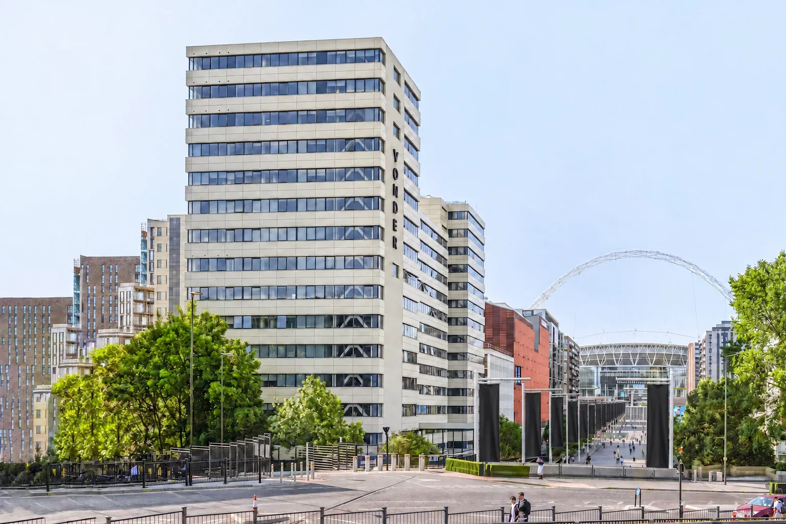 The Vonder Wembley building on Olympic Way, with Wembley Stadium and its arch in the background